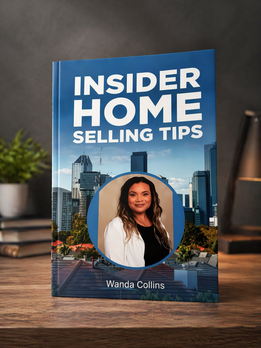 Book titled 'Insider Home Selling Tips' by Wanda Collins on a wooden surface with a cityscape background.
