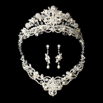 Silver tiara and earrings set on a black background